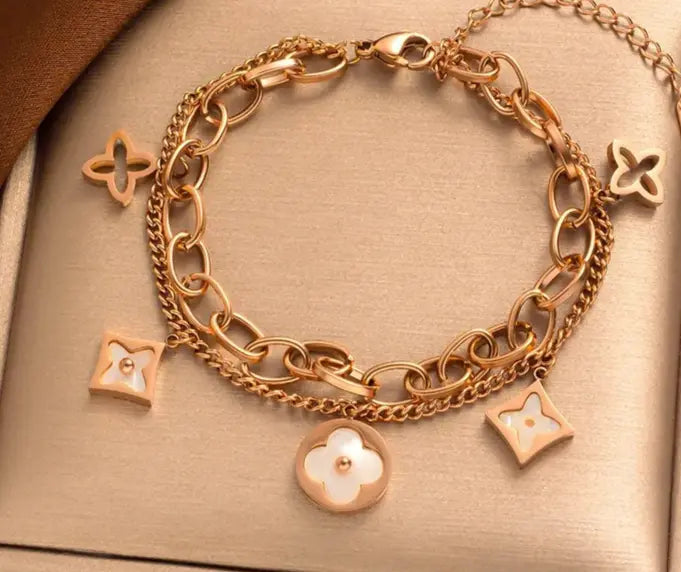 Pulsera de acero inoxidable bañada en oro de 18 k con dijes